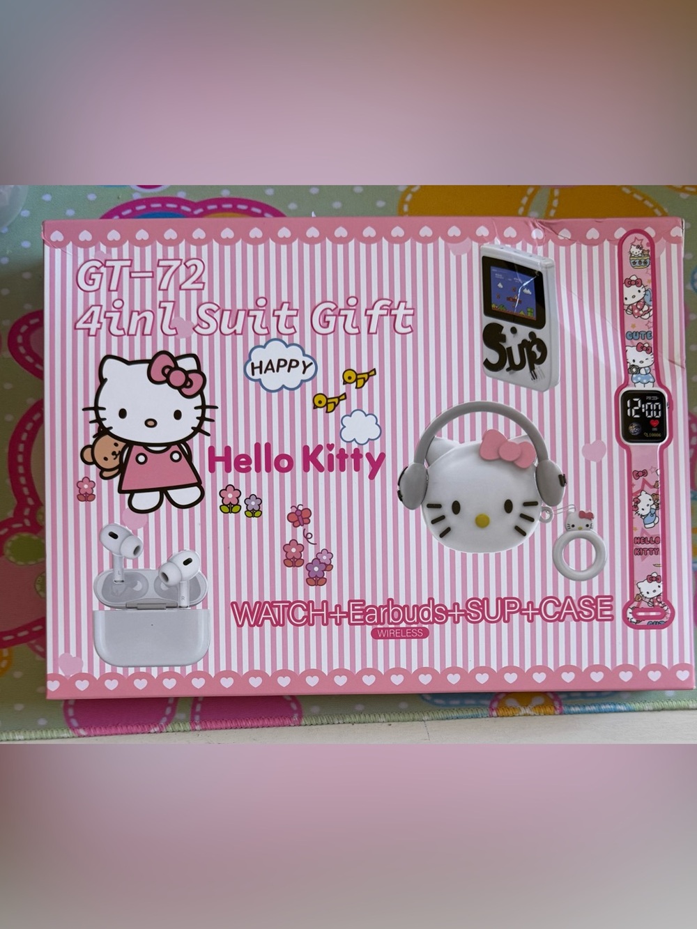Hello Kitty E-Gift Set Earbuds, case, watch, and Game system